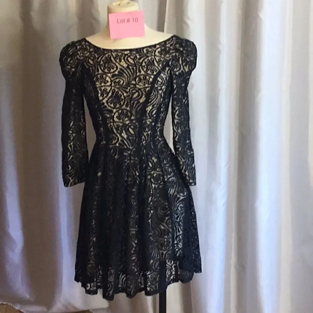 Form fitting black lace dress with long sleeves in size small by ARK & CO.